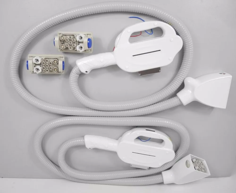 

IPL Elight hand piece , model X spot 15*50 ,without filter ,German hose with triangular connector installed 12 V counter UK lamp