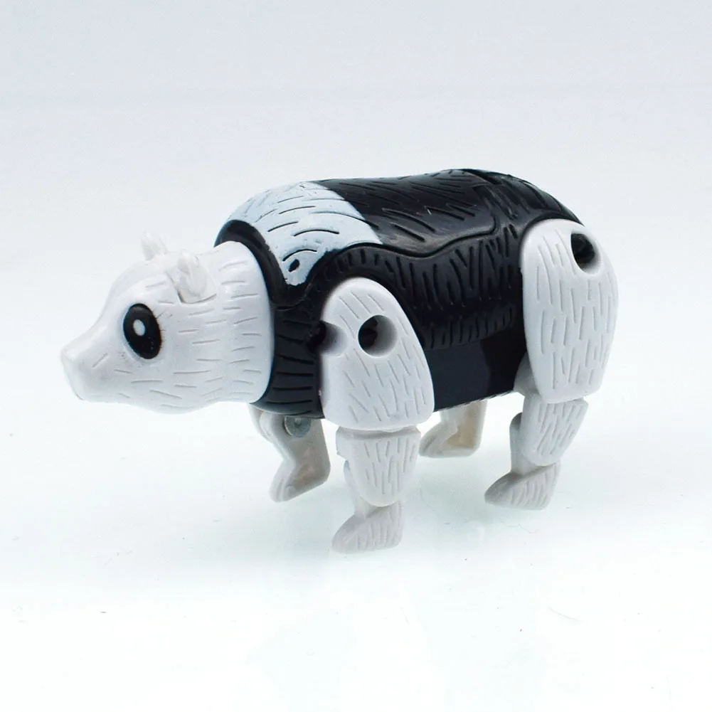 

100pcs/lot The Deformation Saber-toothed Tiger Gorbachev Bird panda dog Prehistoric Animal Eggs Models Action & Toy Figures