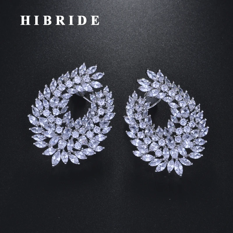 Женские серьги-гвоздики HIBRIDE белого и золотого цвета с прозрачными фианитами