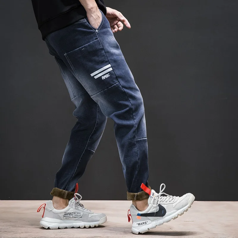 Мужские зимние обтягивающие штаны шаровары теплые джинсы плотные Стрейчевые