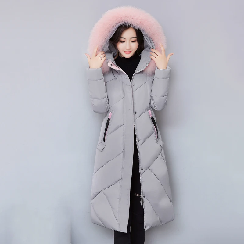 Длинная женская зимняя куртка с меховым воротником и капюшоном однотонная