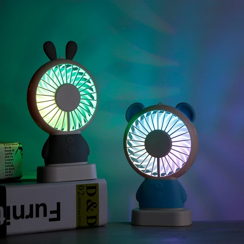 

Rechargeable Fashionable Mini Portable Linglong Rabbit Damo Bear Handheld Personal Handy Fan LED Colorful Light