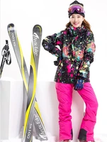 women waterproof 10k ski suit female riding climbing skiwear black graffiti jacket and rose red suspender pants set