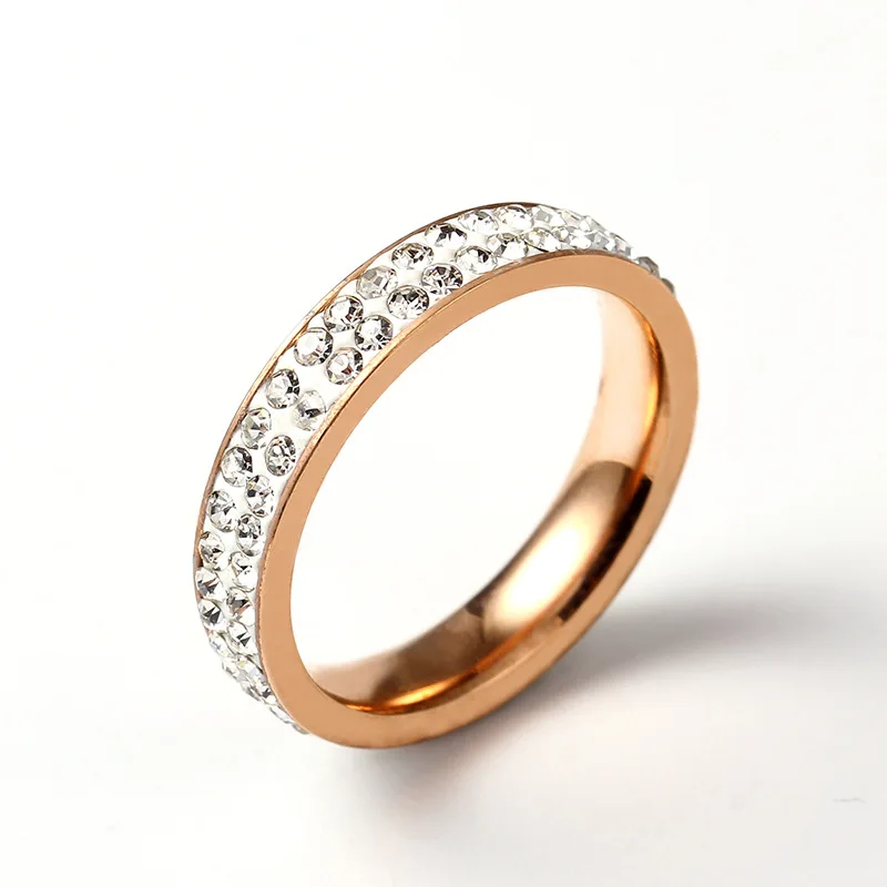 Женское кольцо из нержавеющей стали под розовое золото с прозрачным