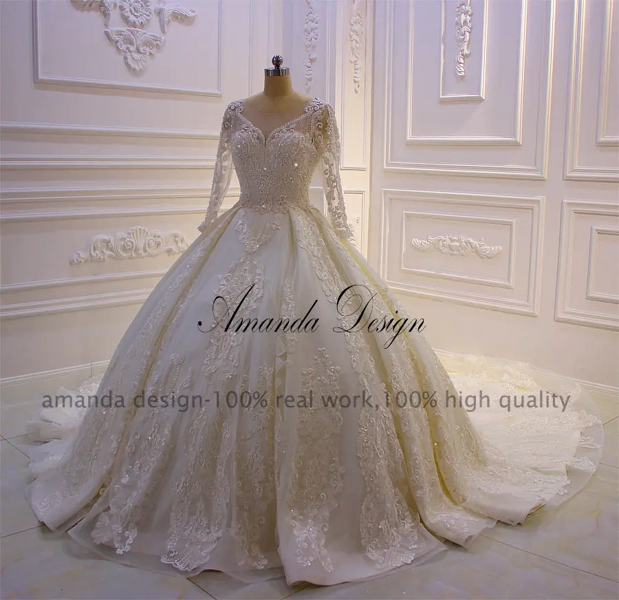 Свадебное платье с длинным рукавом и кружевной аппликацией Amanda Design abito da