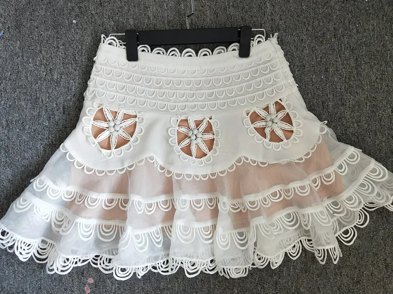 

Nice Runway Skirts WomenTutu Mini Skirt Hollow Out Elastic High Waist Draped Skirts Female Summer Fashion Sexy Clothing Lady