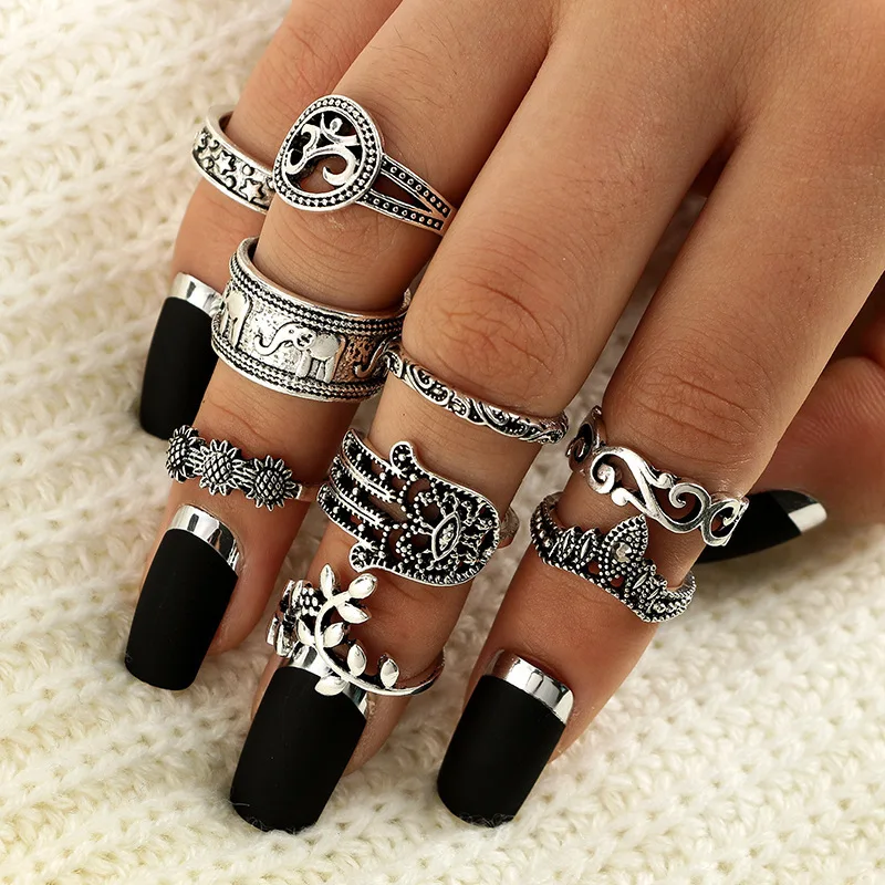 

9pcs of pack personality creative vintage totem knuckle rings for women with carved flower /animal design female knokkels rings