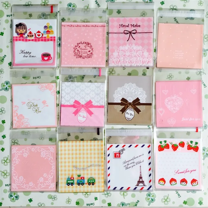

22 Designs 100Pcs Clear Plastic Cookie Packaging Bags Party Supplies Wedding Decoration Gift Candy Bag Biscuit Bag 10*10cm