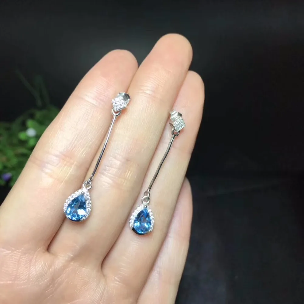 

Almei Natural Blue Topaz Earrings for Women, 925 Sterling Silver, 5*7mm*2 Pcs Birthstone Gemstone Wedding Party Jewelry FR102
