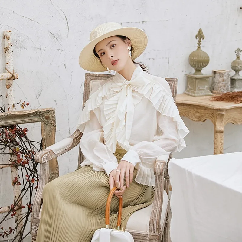 Женская блузка с бантом TWOTWINSTYLE летняя однотонная длинным рукавом и оборками
