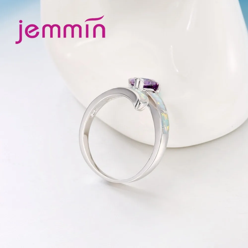 Кольцо из серебра 925 пробы с фиолетовым кристаллом и белым опалом | Украшения