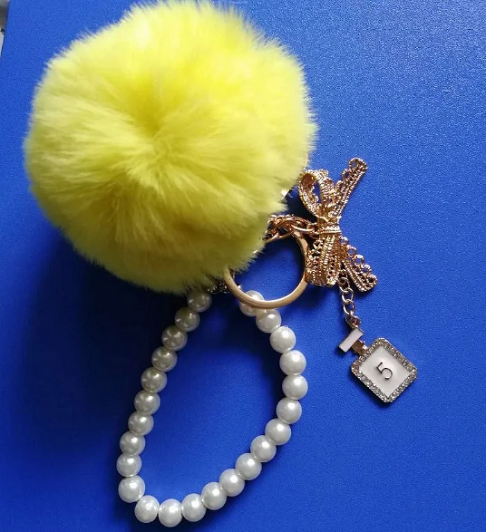 Yellow bell Модная жемчужная цепочка, Хрустальная бутылка, бант, помпон, брелок для автомобиля, Женская сумочка, брелок для ключей, кольцо, пушистый шар, брелок ювелирный - Цвет: Yellow bell