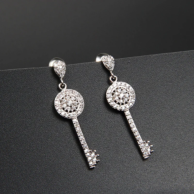 

Trendy Zirconia Clear Crystal Key Luxury Pave Full Cz Design Wedding Personality Earrings For Women Jewelry 2020