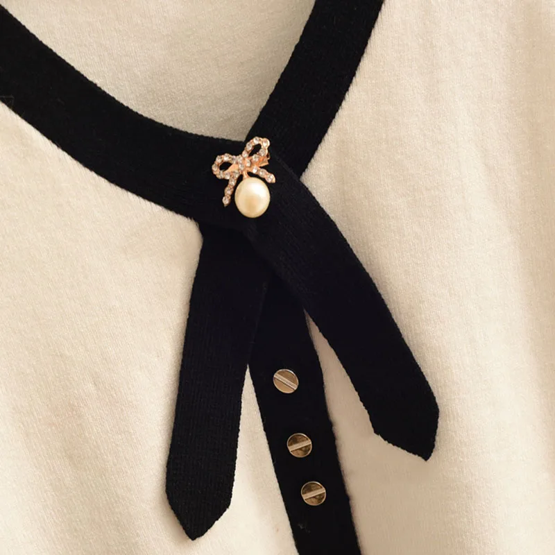 

Early spring cardigan ladies sweater short bow long-sleeved sweater V-neck bottoming shirt Slim sweet wind Women's sweater W105