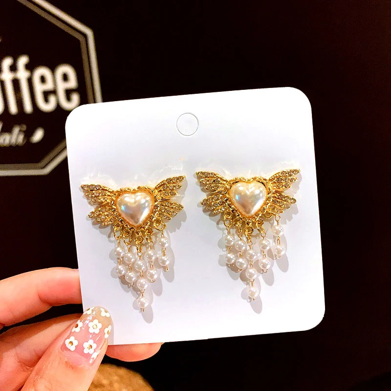 Новый дизайн корейский имитация жемчуга кисточкой серьги Феи бабочки Крылья