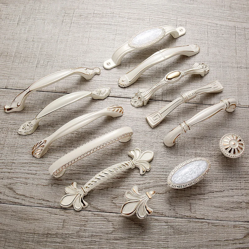 Дверные ручки и цвета слоновой кости для шкафа кухонного мебельные из цинкового