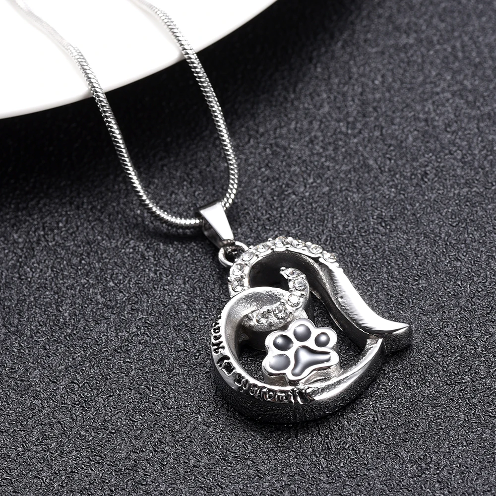 

Pet Paw Print Heart Urn Cremation Jewelry for Ashes Stainless Steel Keepsake Memorial Urn Necklace for Pet Ashes