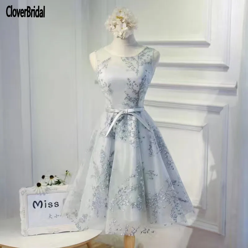 Импортированное из Китая короткое Кружевное ТРАПЕЦИЕВИДНОЕ серое красивое