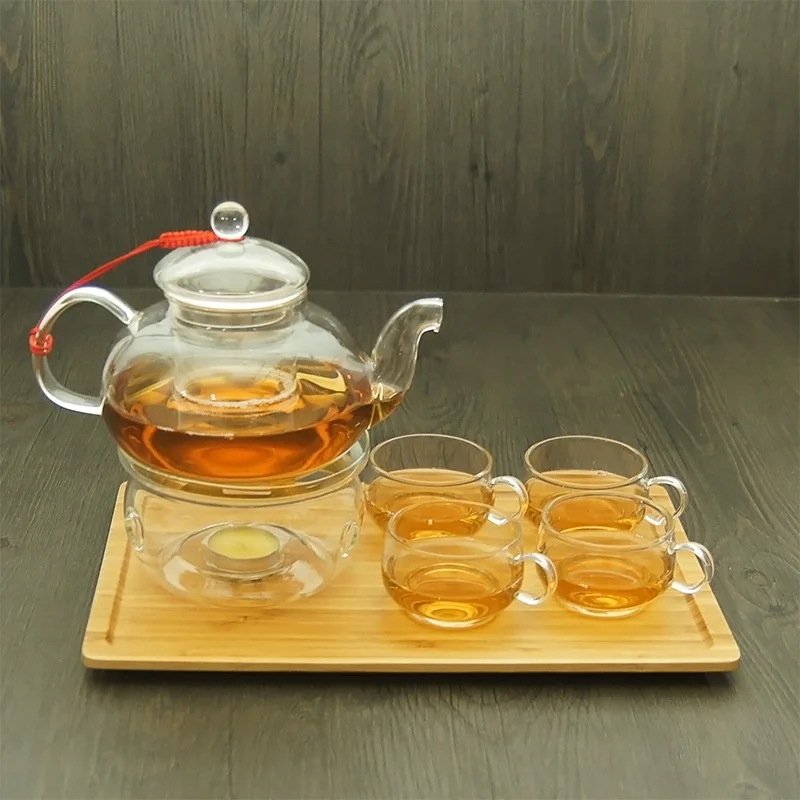 чай в прозрачной чашке. стеклянная посуда для чаепития. прозрачный чайник с чашками. чайник прозрачный. стеклянные чайники и чашки.