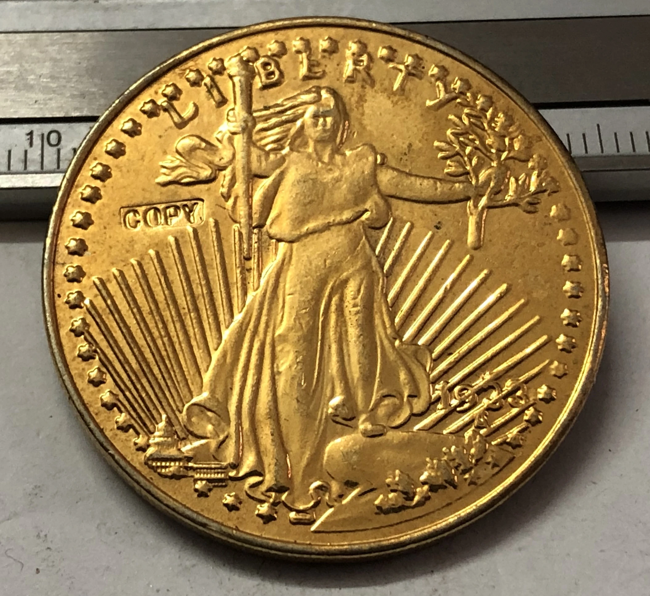 

Точная копия монеты 1933 $ США