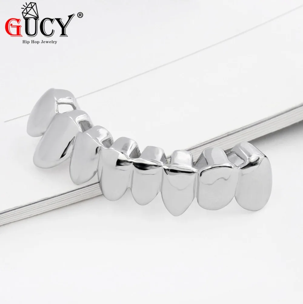 Gucy индивидуальный стиль хип хоп grillz Gold Цвет покрытием капельного Стиль зубы гриль в форме нижней части зуба грили подарок на Хэллоуин
