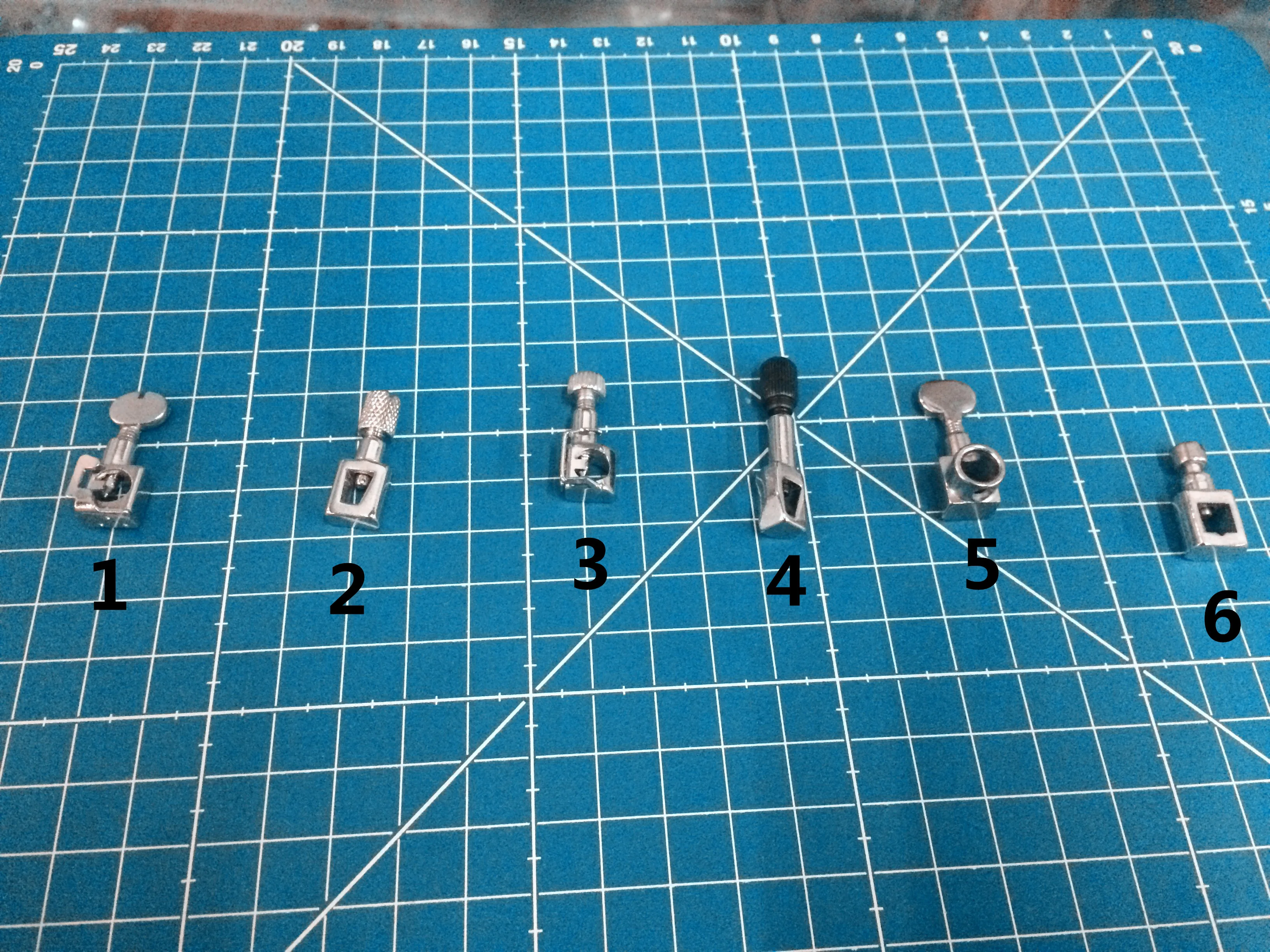 

HOME-SEWING MACHINE. NEEDLE CLIP AND SET SCREW SEWING MACHINE NEEDLE HOLDER