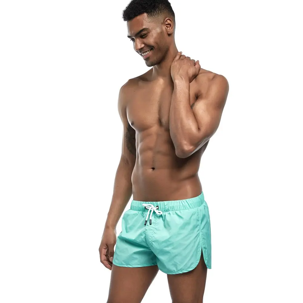 JOCKMAIL новые Брендовые мужские шорты быстросохнущие летние выходные Пляж Surf карманные Плавки Спортивные шорты для бега Hybird
