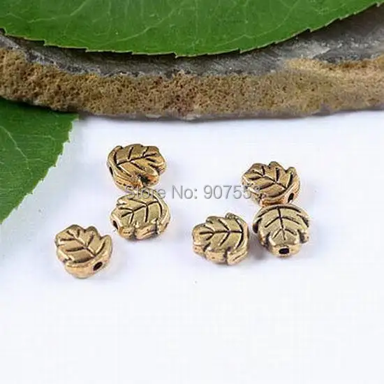 

100pcs dark gold-tone 2sided oblate leaf spacer beads h1834