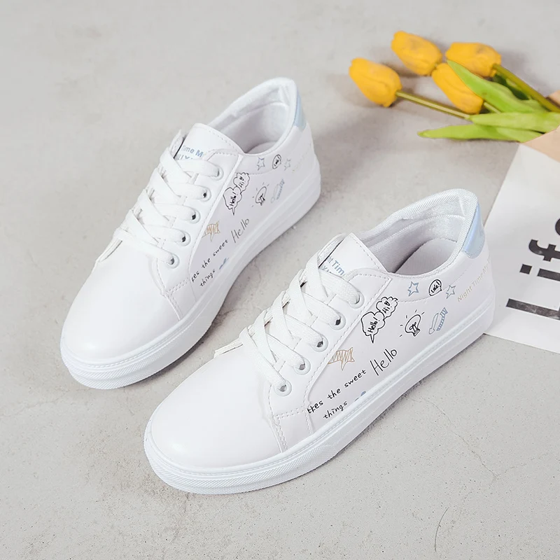 Женская теннисная обувь на шнуровке однотонная Белая из искусственной кожи