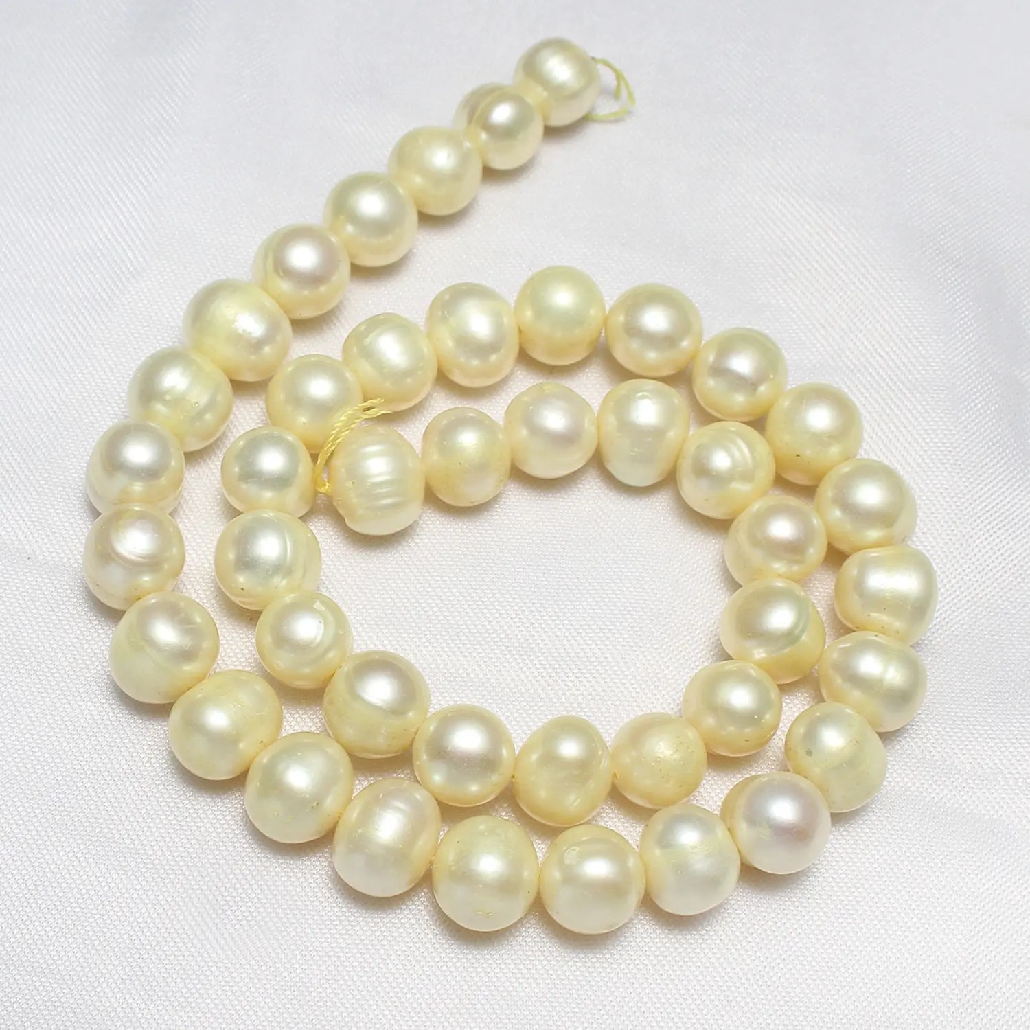 

Cultured Potato Freshwater Pearl Beads 9-10mm Approx 0.8mm Sold Per Approx 14.3 Inch Strand