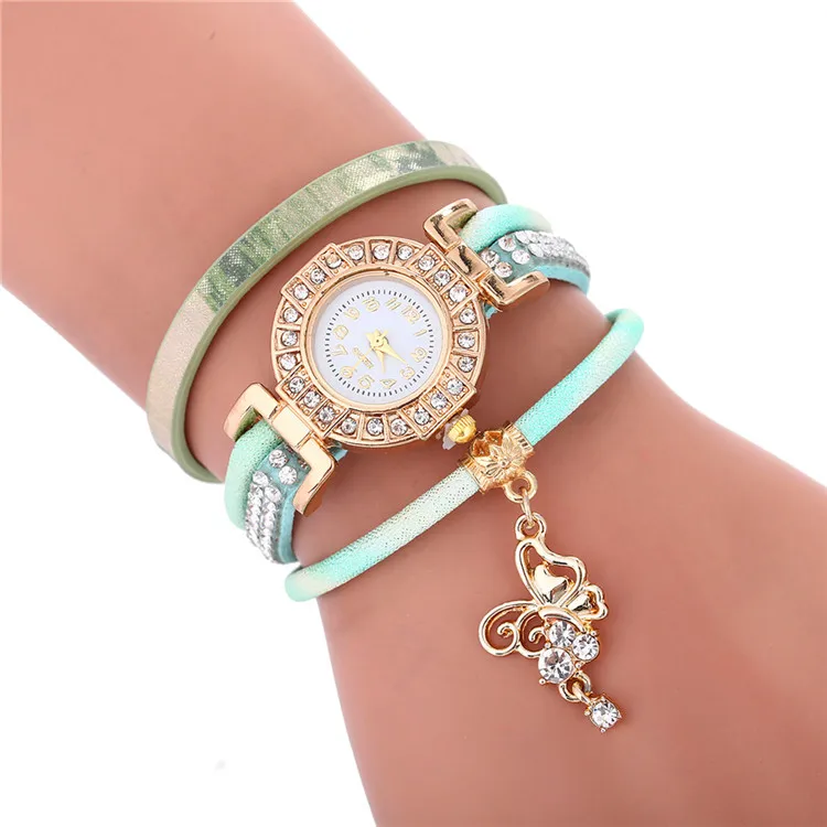 

Wholesale Women Gold Rhinestone Luxury Crystal Gemstone Wristwatches Fashion Casual Women Bracelet Quartz Watches