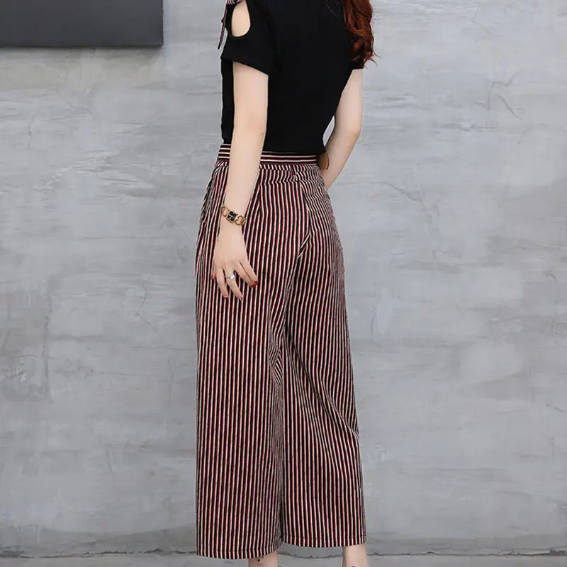 Летний женский костюм комплект из двух предметов в полоску с широкими штанинами