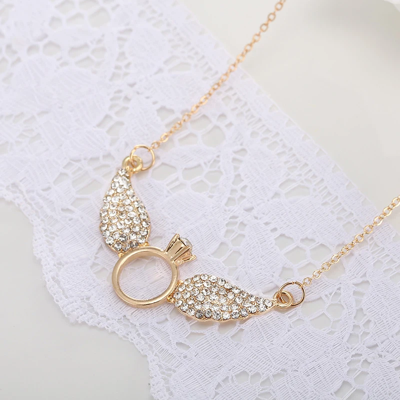 Ожерелье с подвеской в виде крыла кристаллами золотого цвета|necklace pendant gold|stone