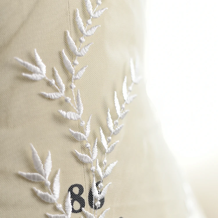 Новинка 2019 модная Тюлевая кружевная ткань цвета слоновой кости с листьями Лидер