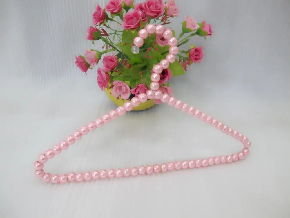 

30CM powder pearl triangle children clothes rack ABS plastic clothes rack bead hanger wholesale factory pin