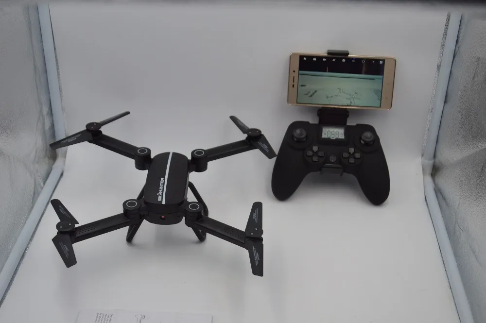 Оригинальный квадрокоптер с Wi-Fi FPV камерой 0,41 Мп, складной, с удержанием высоты и без головы X8TW.