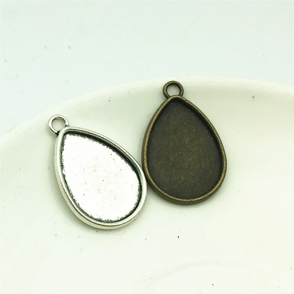 

Tear Of Sea Alloy 10pcs/lot Tow Colors Water Drop Shape Cameo Cabochon Setting Base 21*32mm(Fit 18*25mm) Cabochon Tray AXDT113