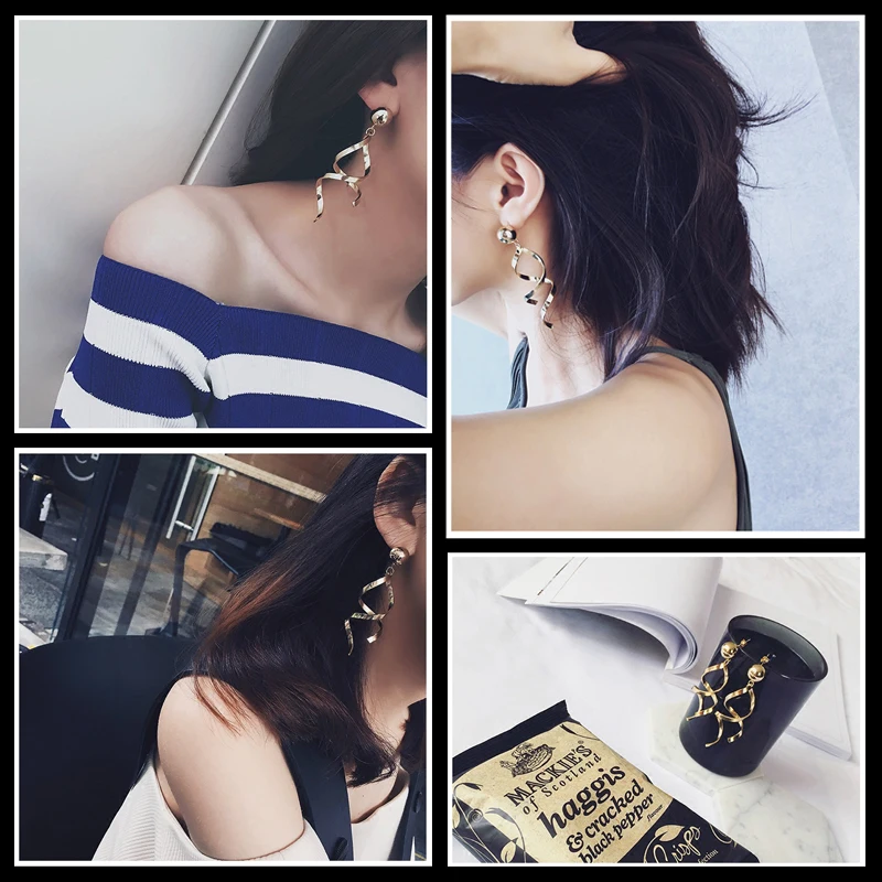 Женские серьги-подвески золотистого цвета с изогнутой асимметричной подвеской |