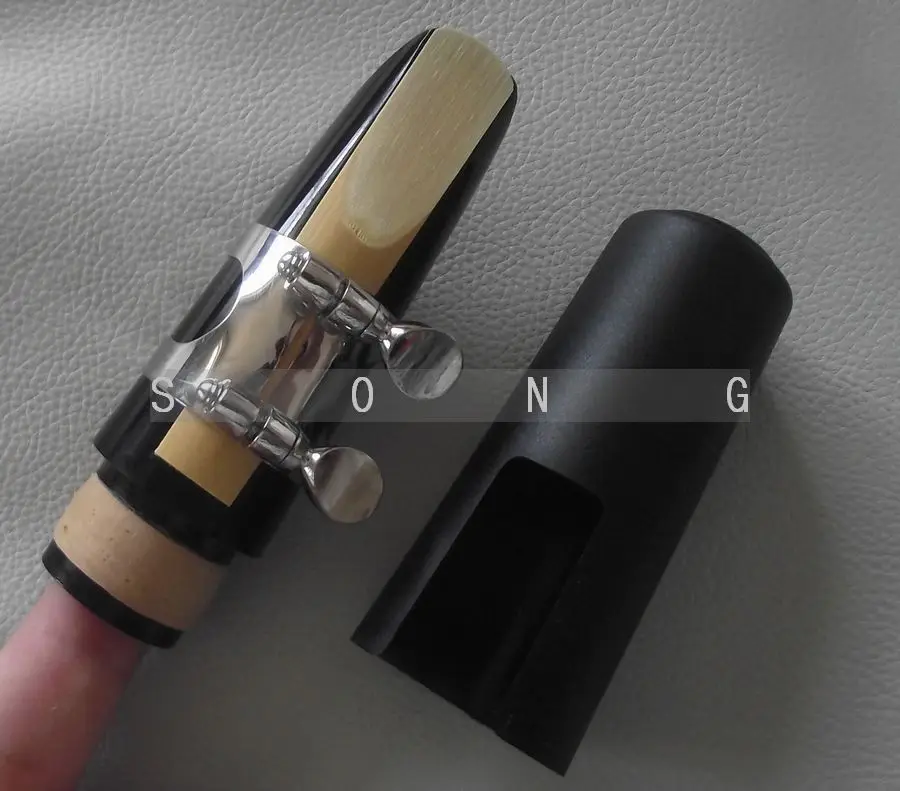 

Bb Soprano clarinet Mouthpiece Ligature cap and reed Good sound