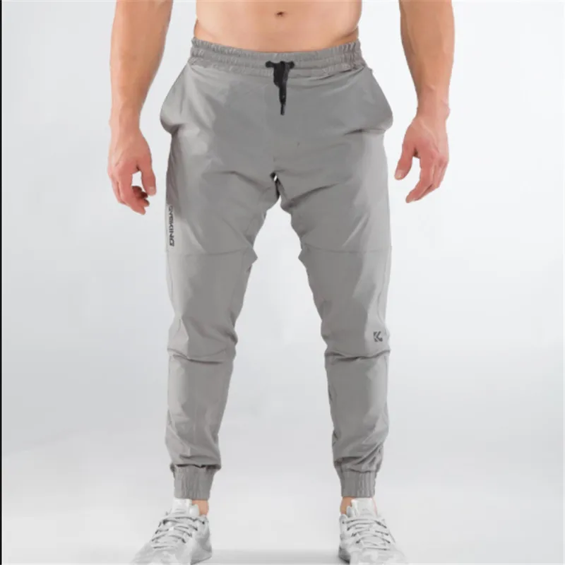 

2019 summer New Sweatpants Jogger Fashion gyms Thinse ction Pants Men Casual Trouser Bodybuilding Fitness Sweat mens clothing