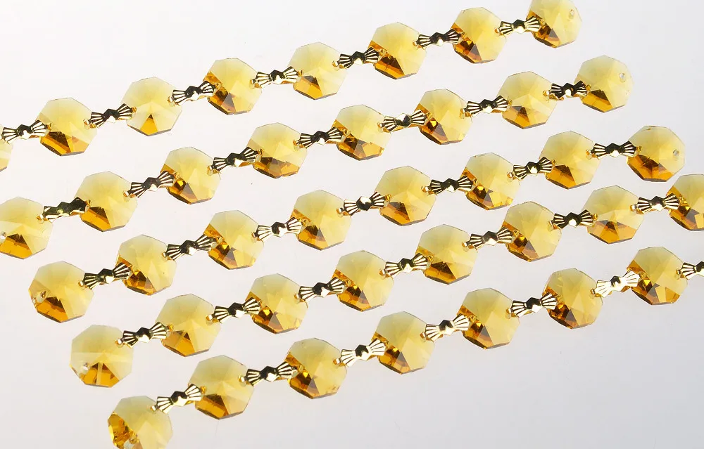 

Garland Spectra 3 Feet Golden Prisms Glass Crystal Octagon Beads 14mm Wedding Chandelier Parts Suncatcher Rainbows M02050-5