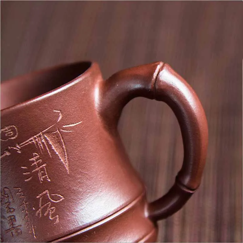 

Yixing teapot handmade tea cup holder with bamboo leaves the handle office gift cup 130ML