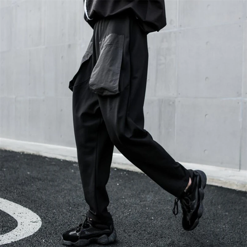 Женские свободные короткие шаровары черные брюки с эластичным поясом и большим