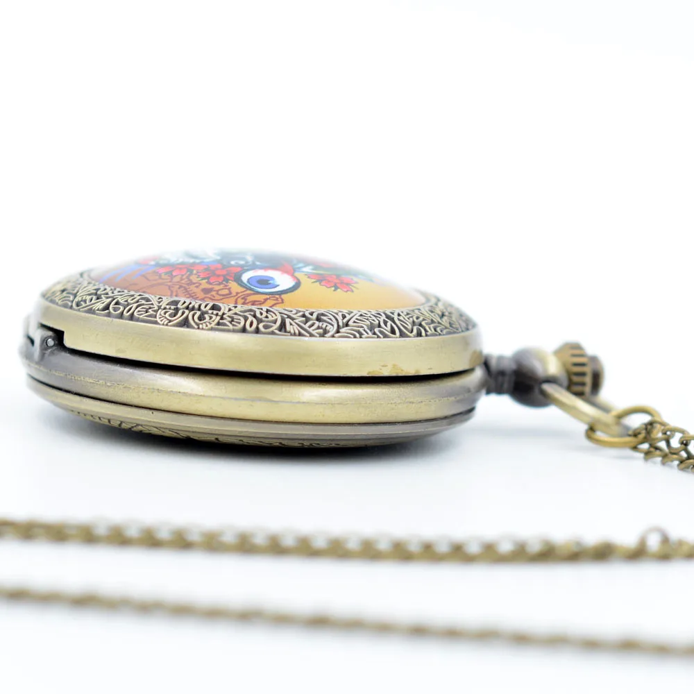 Новые модные кварцевые карманные часы с бронзовым черепом и глазами Бога