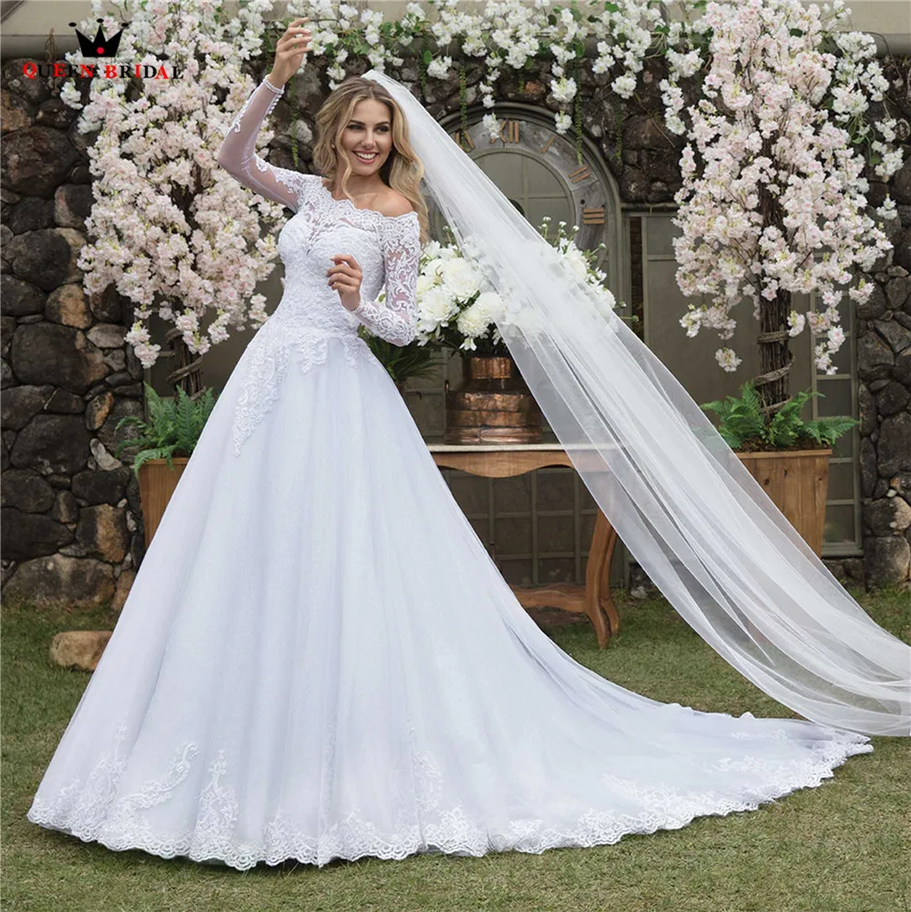 

Custom Made Ball Gown Long Sleeve Tulle Lace Appliques Beading Crystal Elegant Wedding Dresses Vestido de Noiva 2021 WH61