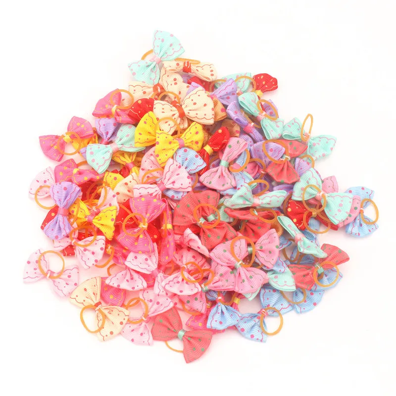 

Pet jewelry dog head flower pet dog bow rubber band pet jewelry spot supply 100pcs