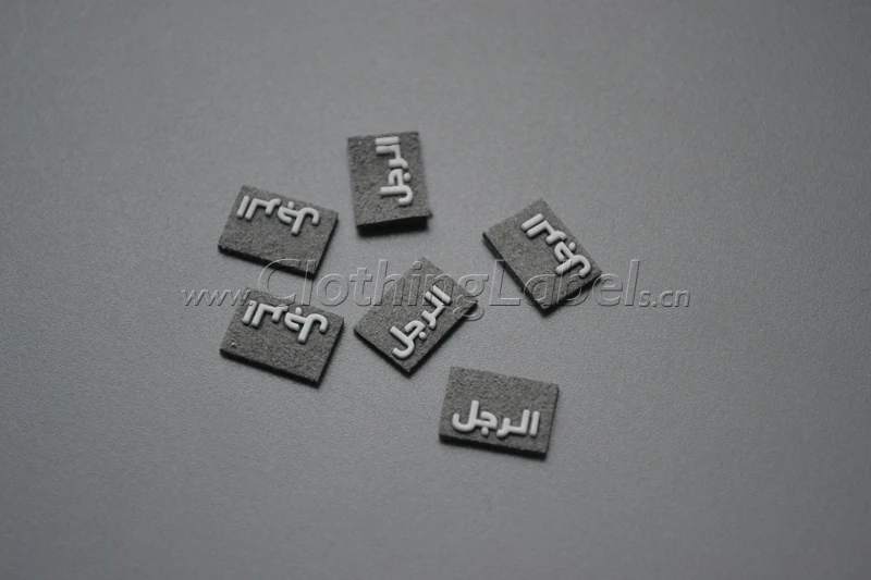 Пользовательский 3D резиновый этикетка тисненый логотип на сером замшевом