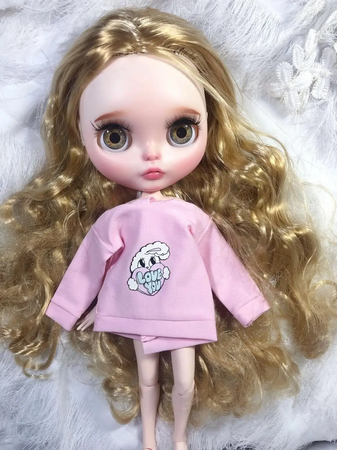 

Medium gold wave doll Excluding clothes.