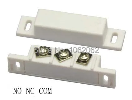 Магнитный выключатель для дверных и оконных датчиков установленный на