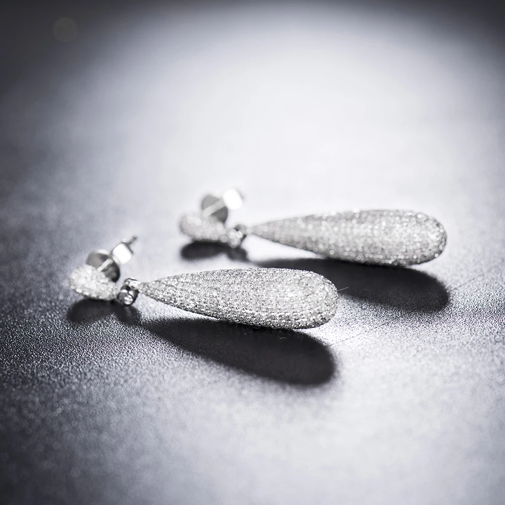 Женские серьги 14kt длинные золотистые для продажи расположенные в двух